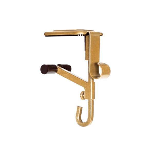 Elegant black & gold Christmas mantle holders for secure stockings & garlands.