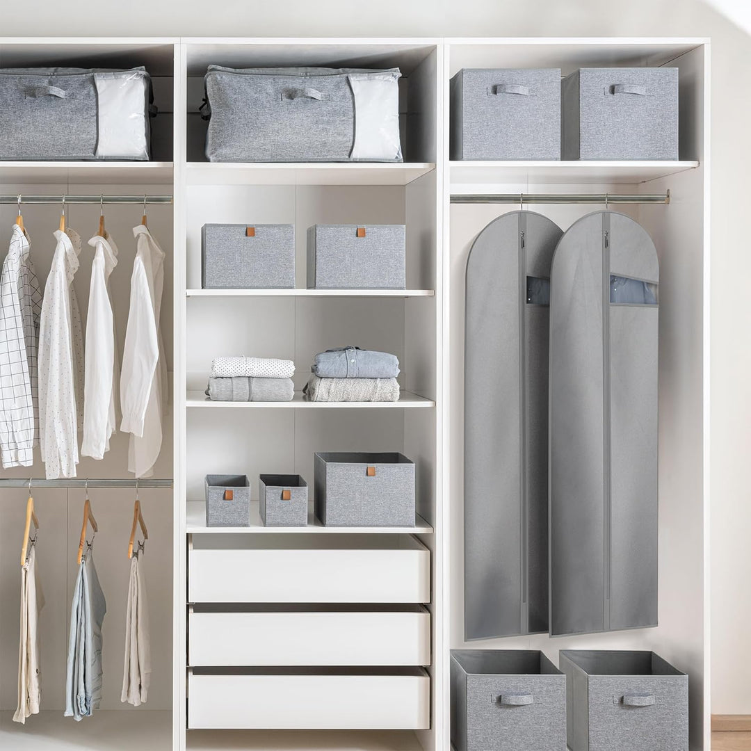 Garment bag being packed with multiple garments, ideal for extended trips