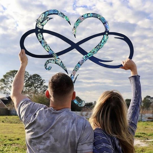 Elegant steel Infinity Heart wall art in black, a romantic interior accent and unique gift for loved ones.