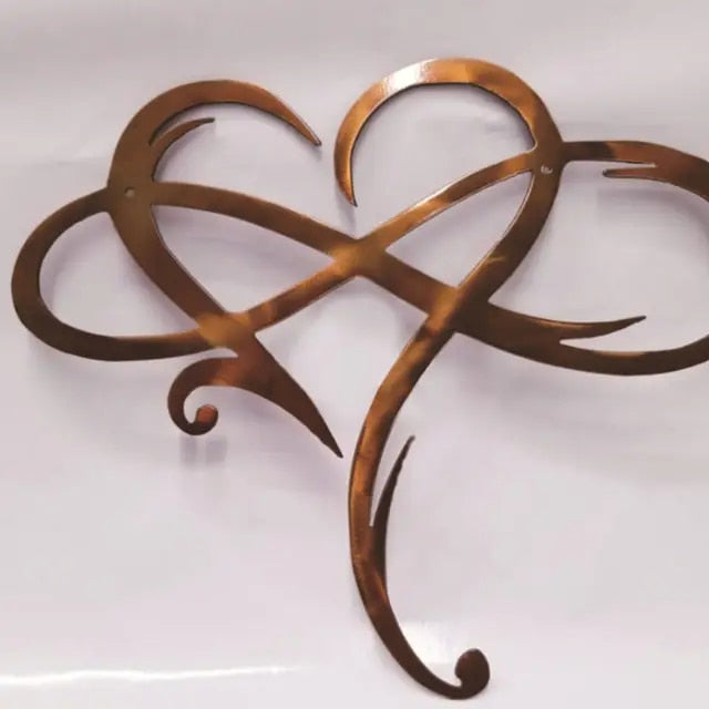 Sapphire blue Infinity Heart metal wall decor, a modern art piece symbolizing endless love and passion.