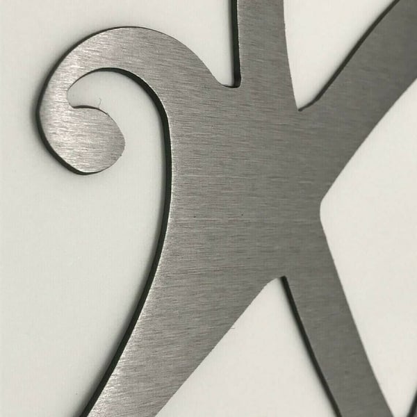 Timeless Infinity Heart love symbol crafted in metal, perfect for wall decoration & modern art display.