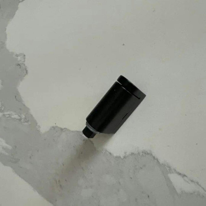 Adhesive magnetic door holder, available in black or bronze, offers drill-free installation for home safety.
