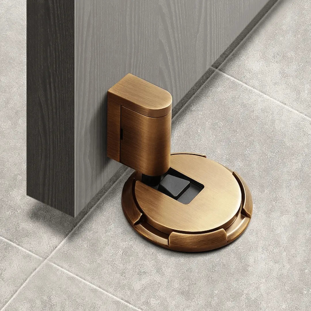 Black magnetic door stopper with no-drill self-adhesive design for easy home installation & wall protection.