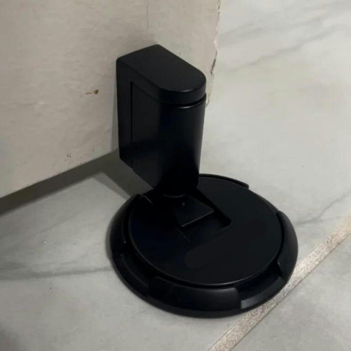 Easy installation no-drill magnetic door holder; sleek black design protects walls & floors quietly.