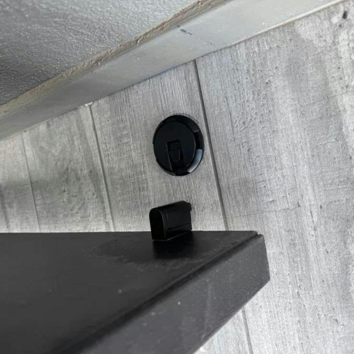 Modern bronze magnetic door stopper, self-adhesive & no-drill for home safety & wall protection.