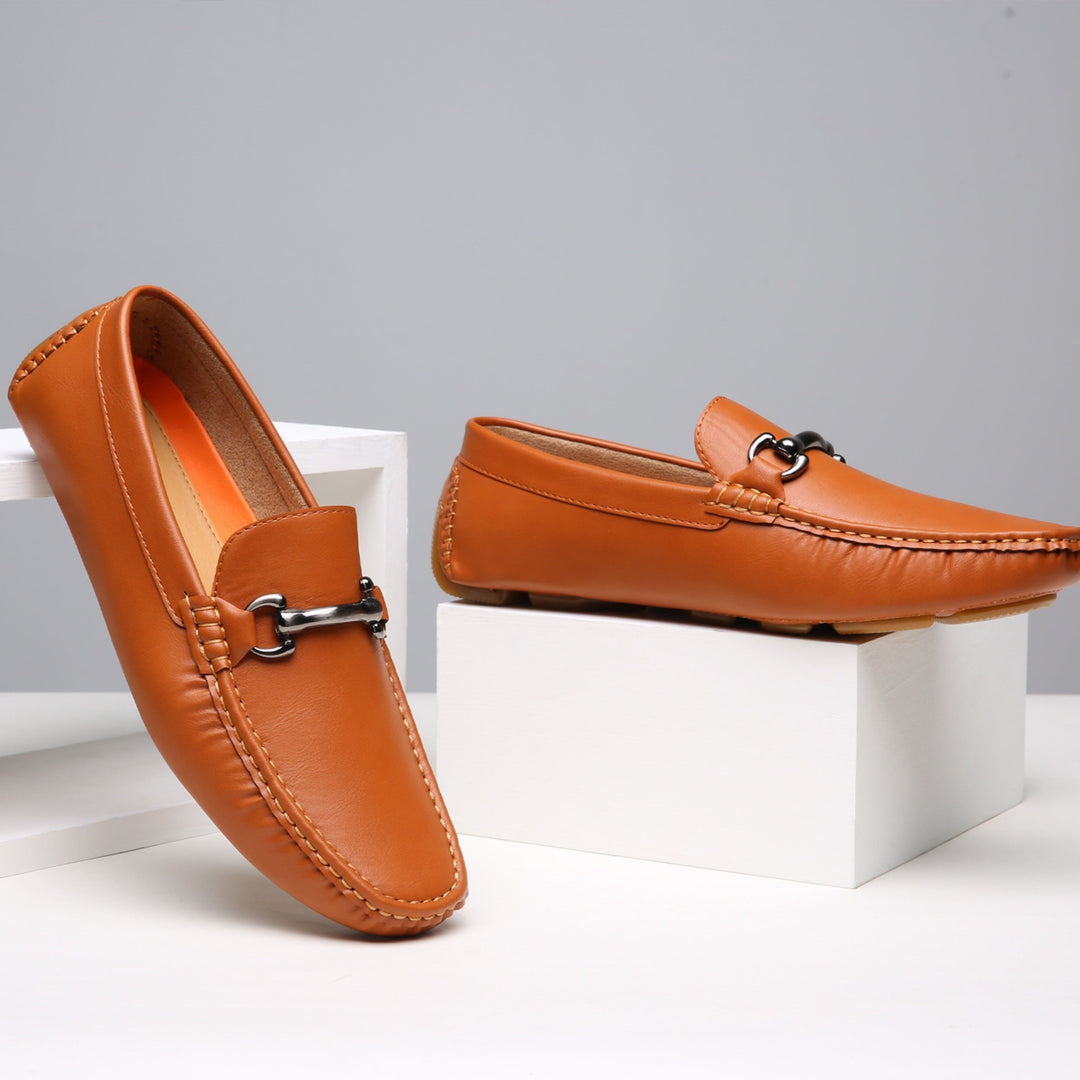 Black men's classic slip-on loafers for formal occasions. Elegant dress shoes for modern men's fashion.