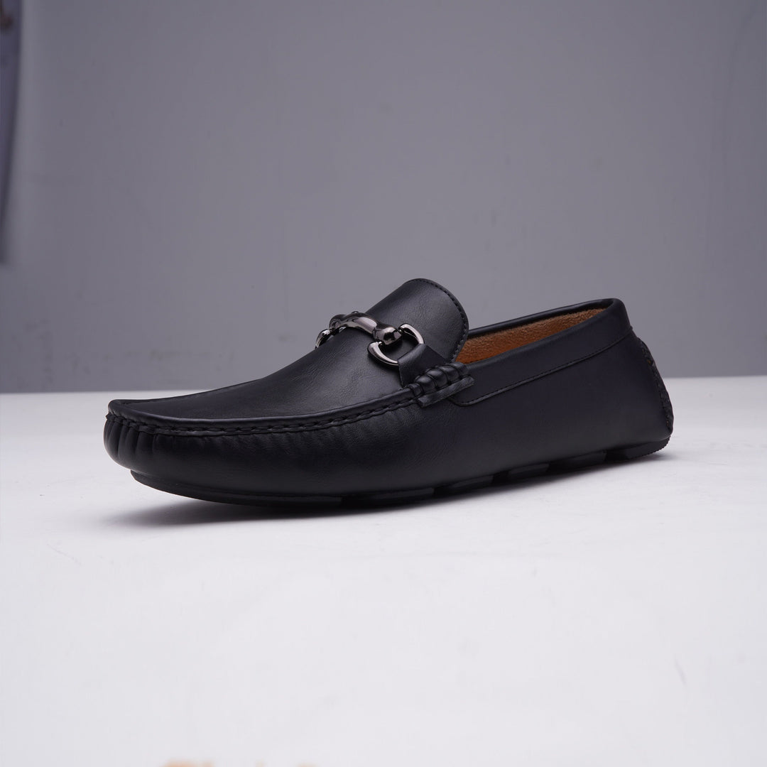 Brown classic men's slip-on loafers. Comfortable formal footwear, perfect for business casual style.