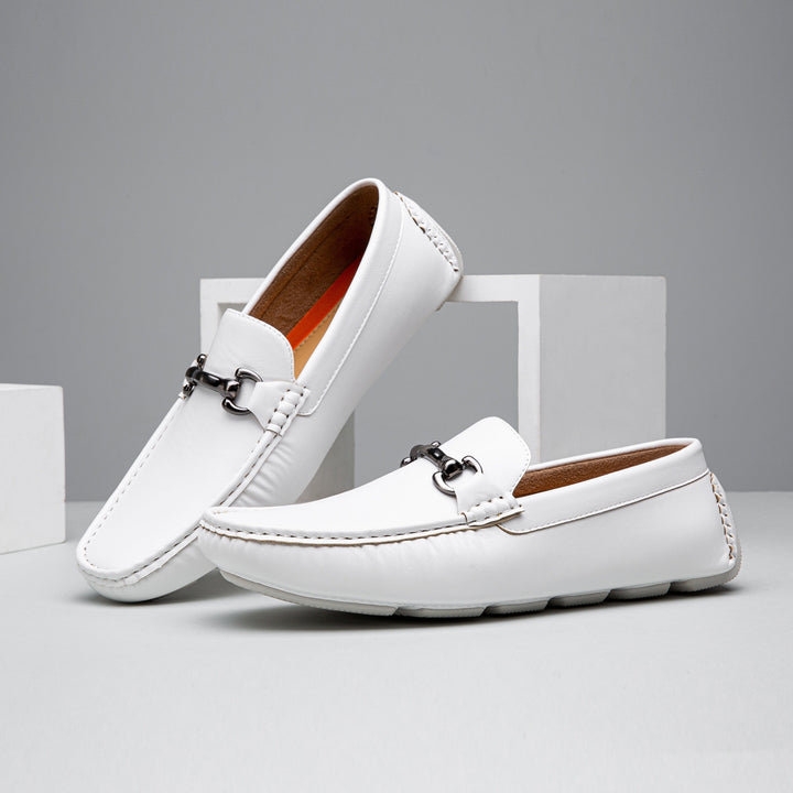 White men's elegant slip-on loafers. Stylish and comfortable dress shoes for formal or smart casual events.