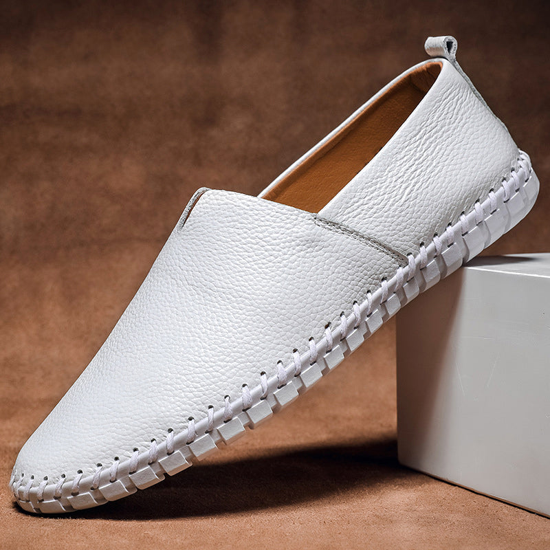 Comfortable men's black slip-on loafers, designed for all-day wear. Sleek versatile casual & dress shoes.