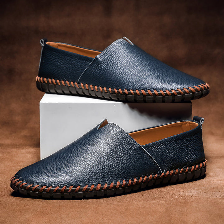 Elegant men's black dress loafers, slip-on style. Ideal formal footwear for business & special occasions.