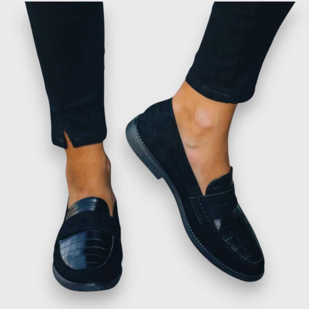 Comfortable ergonomic men's slip-on loafers in black; perfect for formal, casual, and everyday wear.