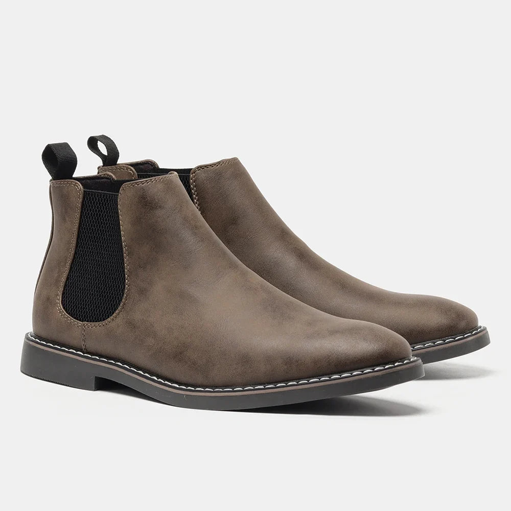 Sleek & timeless Men's Wyndham Chelsea Boots; classic slip-on ankle boots for men's fashion.