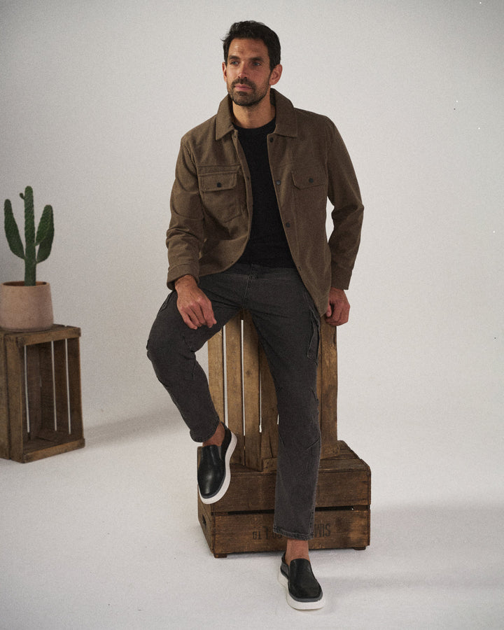 Men's durable black slim-fit cargo pants, multi-pocket design, ideal for casual utility and comfort.