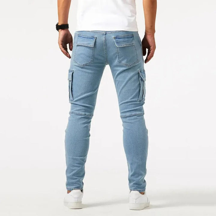 Blue slim-fit utility cargo pants for men, modern design, practical pockets & durable comfortable fabric.