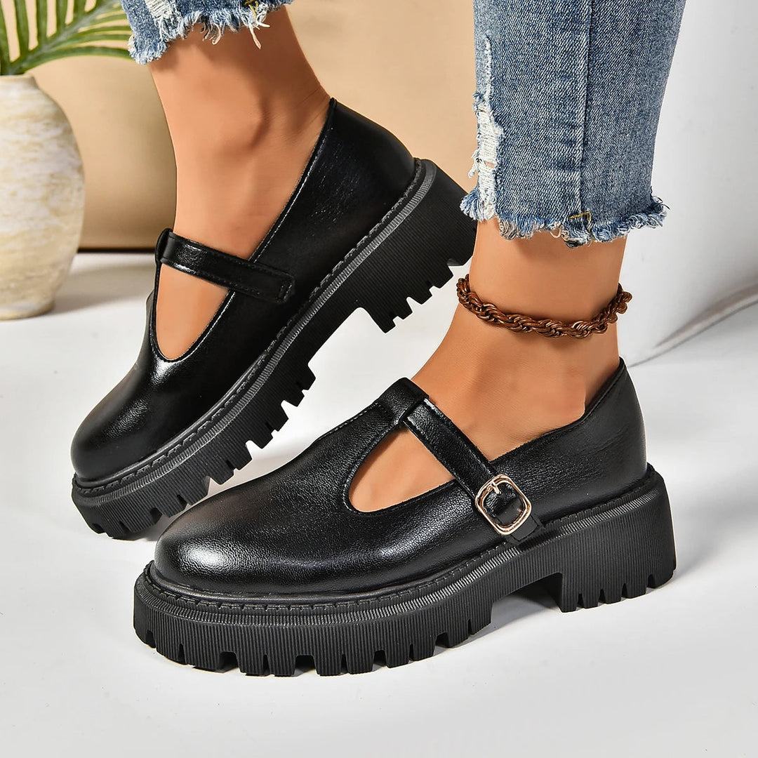 Black T-Strap Platform Mary Jane shoes for women, offering orthopedic support & retro style with a buckle closure.