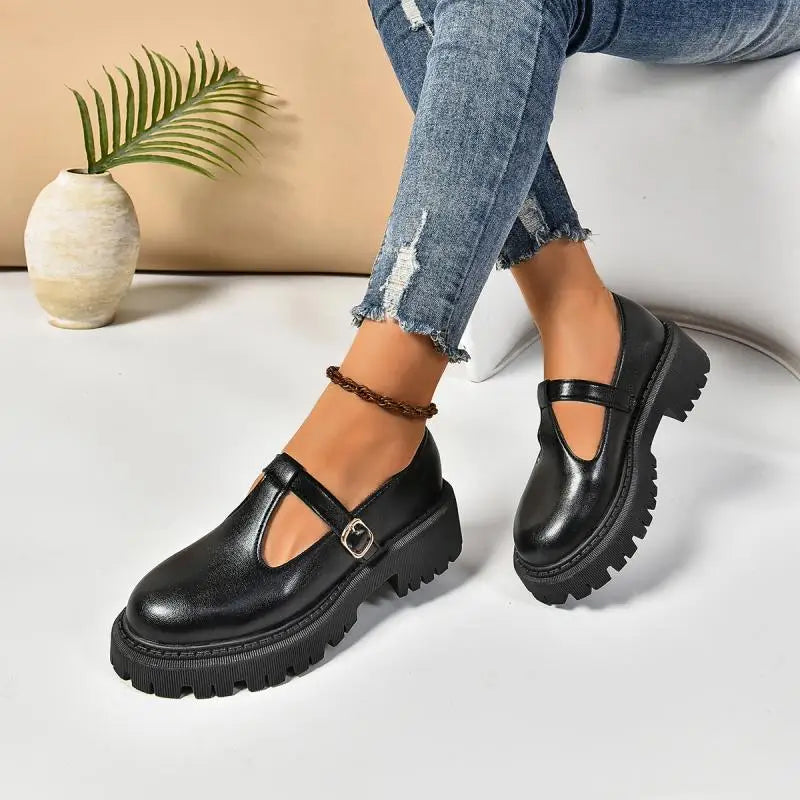 Elegant black T-strap platform Mary Jane shoes for women, featuring sturdy platform and supportive orthopedic design.