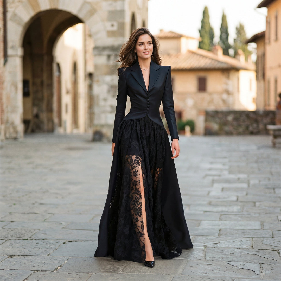 Luxurious women's black formal wear set: a tailored blazer and an elegant evening gown with a chic thigh slit.