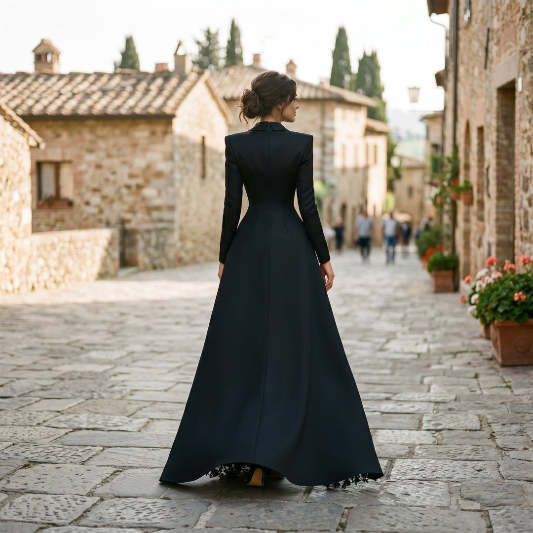Sophisticated black women's evening set, including a tailored blazer, elegant gown, and stylish thigh slit.