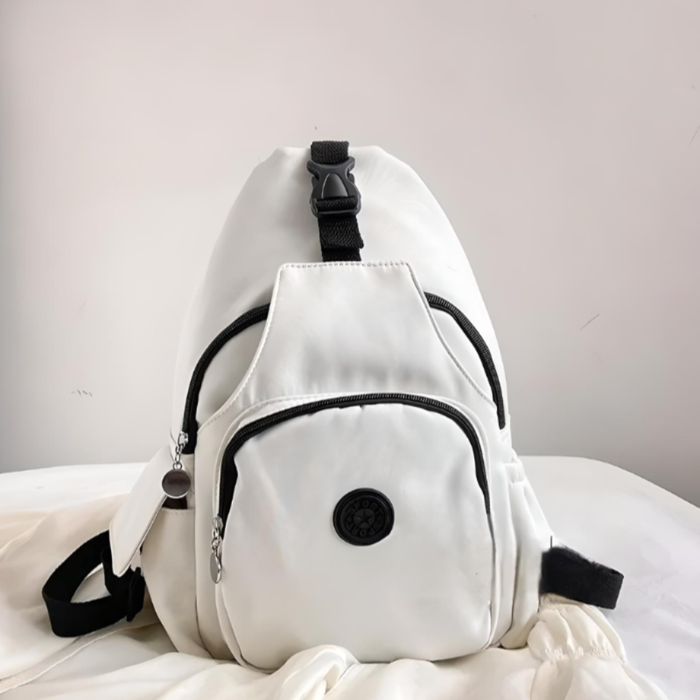 Black unisex anti-theft sling bag with hidden pockets, perfect for secure daily carry and travel.