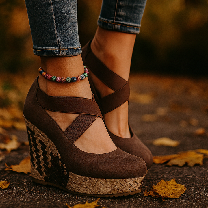 Stylish women's crisscross wedge sandals, perfect for summer casual chic with stable heel support.