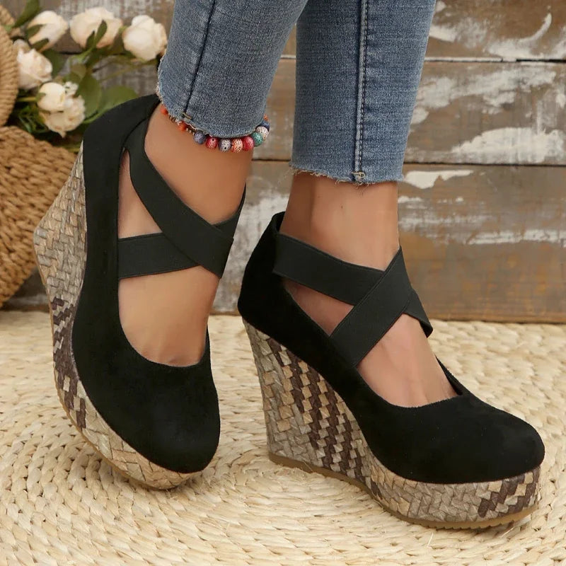 Brown women's crisscross wedge sandals, featuring orthopedic support for comfortable, all-day wear.