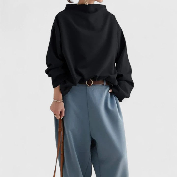 White women's sophisticated high-neck top, long sleeve, perfect for elegant comfort and versatile classic style.