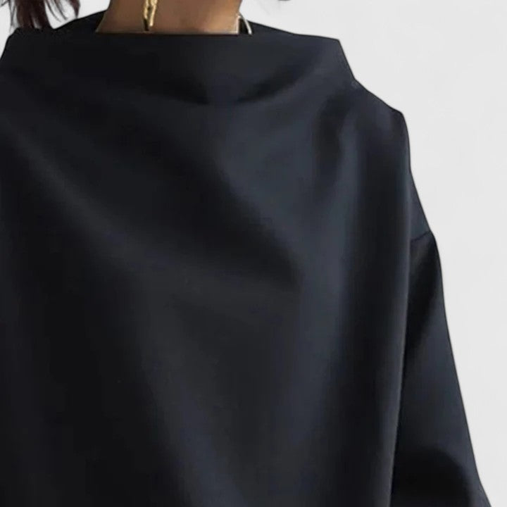 White women's relaxed fit high-neck comfort top, classic long sleeve design for elegant and versatile wear.