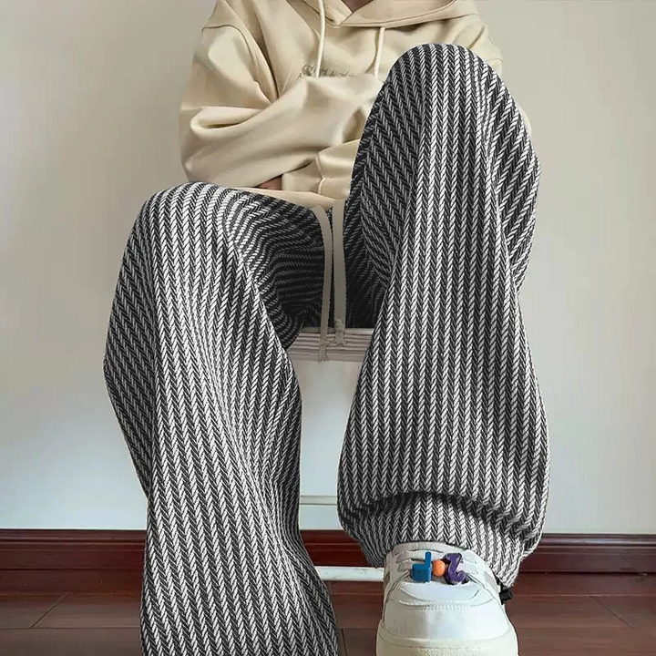 Black Women's Herringbone Wide-Leg Sweatpants with drawstring, perfect for stylish loungewear.