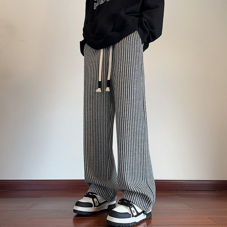 Comfy brown wide-leg sweatpants for women, featuring a chic herringbone pattern & relaxed fit.