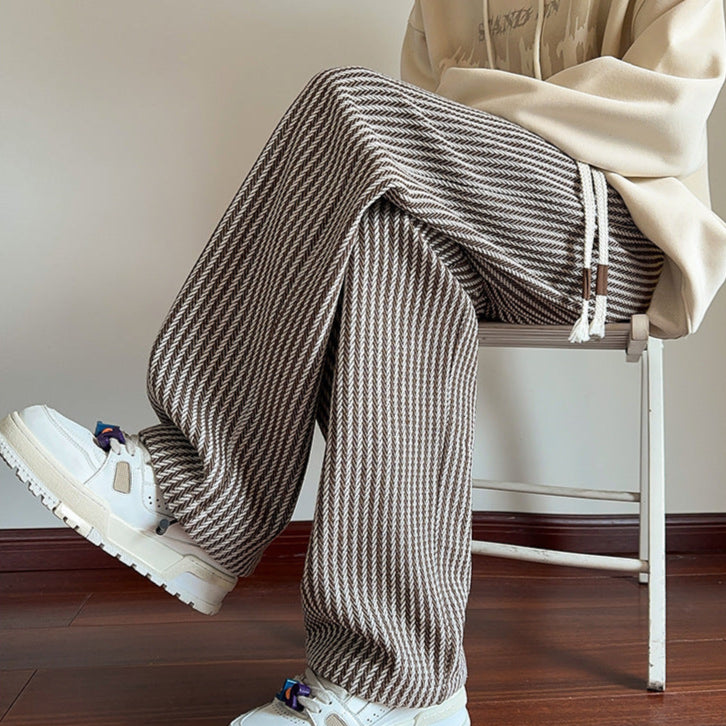 Cozy brown wide-leg loungewear sweatpants for women, featuring a subtle herringbone pattern.