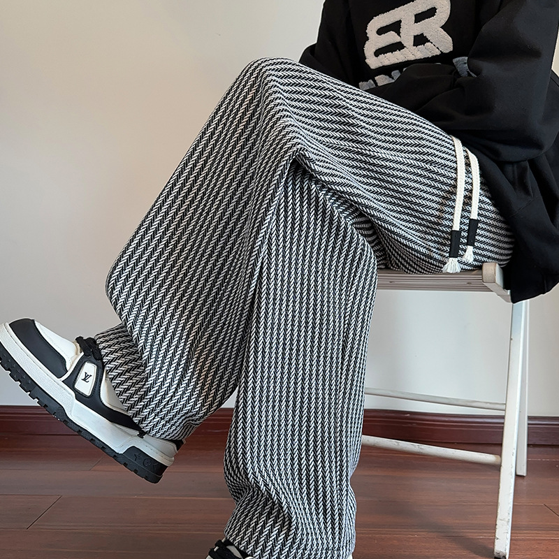 Versatile black women's herringbone wide-leg casual pants, designed for comfort and modern fashion.