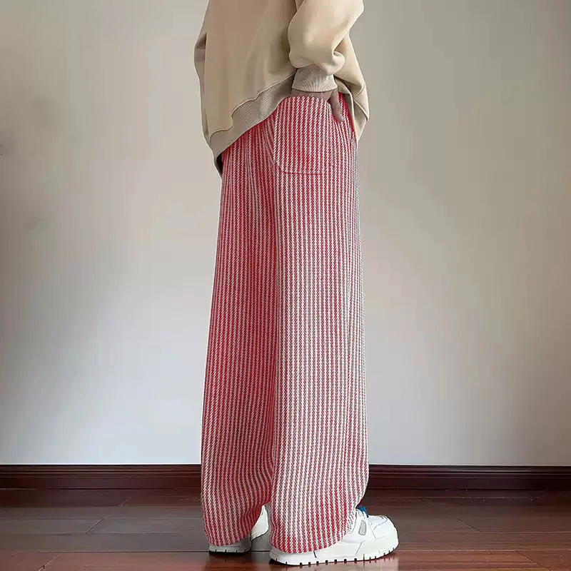 Women's comfy brown herringbone wide-leg sweatpants, perfect for relaxing or casual outings.