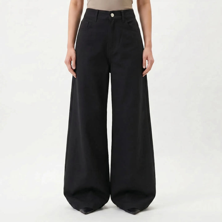 Stylish black wide-leg pants for women, featuring a high waist for a modern, comfortable, and versatile look.