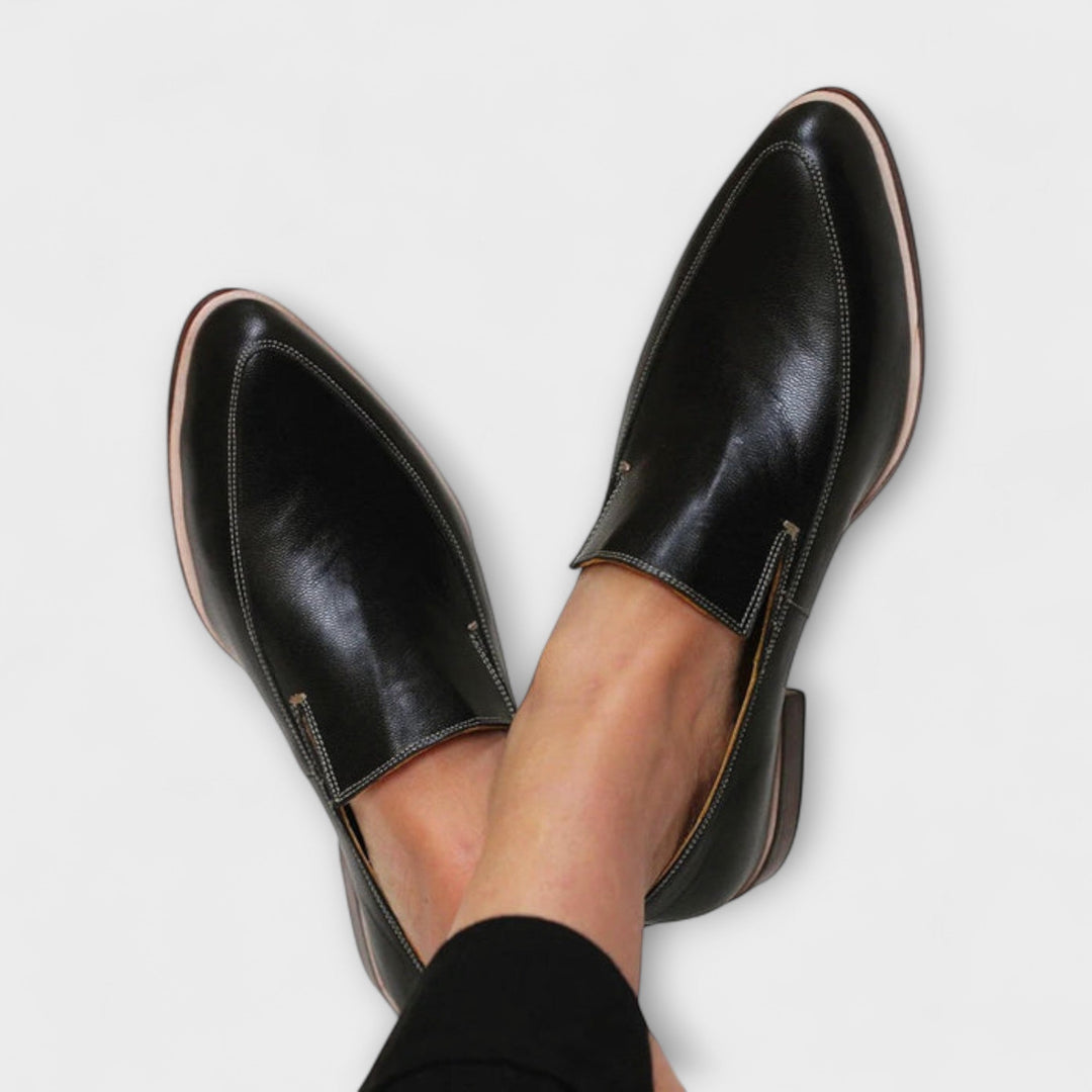 Black women's orthopedic loafers, providing all-day comfort & support for foot health. Casual elegant slip-on style.