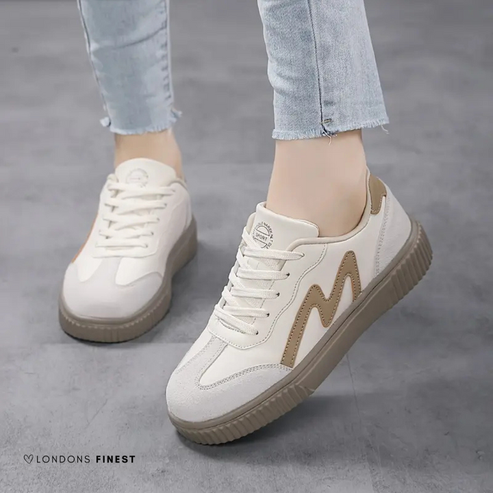 Black women's supportive comfort sneakers with arch support, ideal for everyday walking and stable steps.