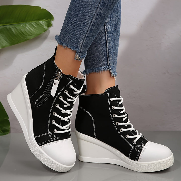 Black Women's Wedge Sneakers offer elevated comfort & modern lift for everyday style.
