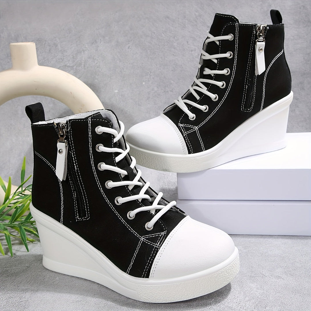 Trendy Women's Platform Wedge Sneakers in black, ideal for fashion-forward casual looks.