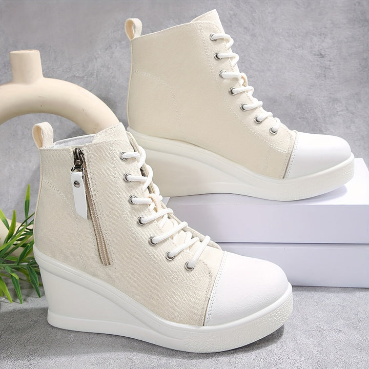 Modern Lift Wedge Sneakers in Denim Blue, designed for women seeking style & comfort.