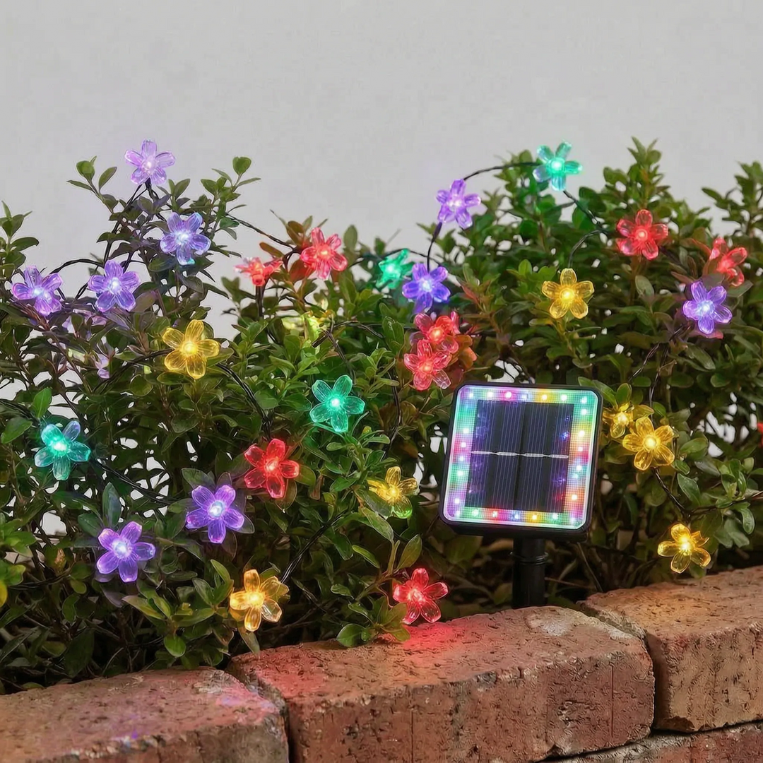 Beautiful solar flower string lights emitting a warm glow, enhancing outdoor living spaces and garden ambiance.