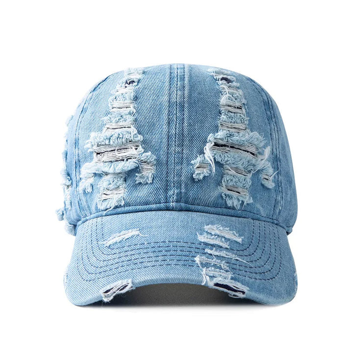 Blue distressed denim cap with raw edge brim, unisex & adjustable fit. Perfect casual streetwear accessory.