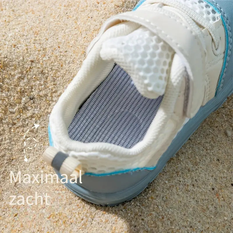 Flexible sole of FlexiToes baby barefoot sneakers, promoting healthy infant foot development.