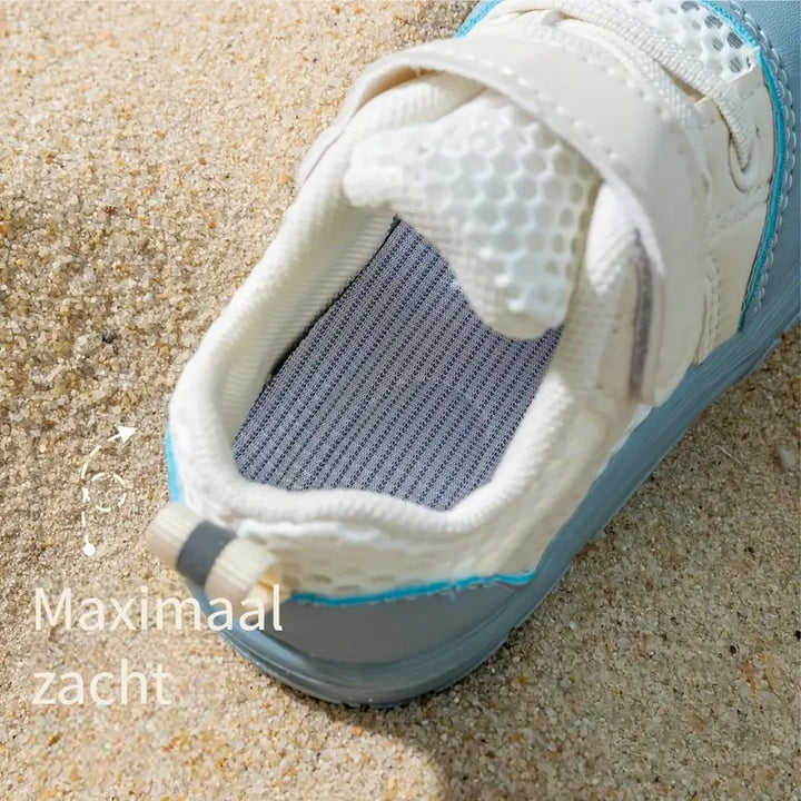 Flexible sole of FlexiToes baby barefoot sneakers, promoting healthy infant foot development.