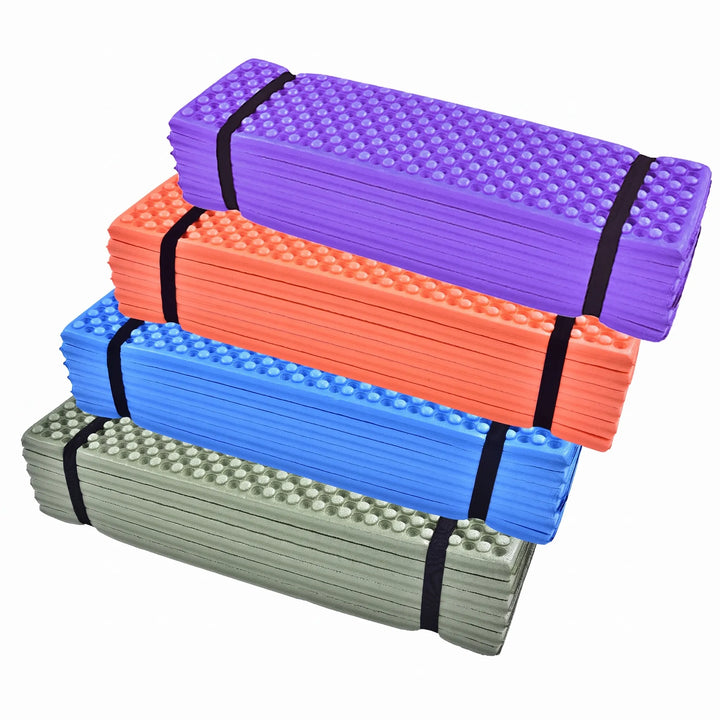 Foldable closed-cell camping mat in blue, ideal for ultralight outdoor adventures.
