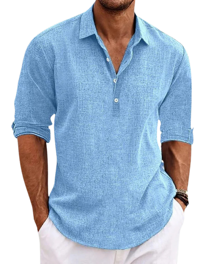 Blue men's classic button-front shirt for smart casual fashion. Versatile everyday men's clothing.