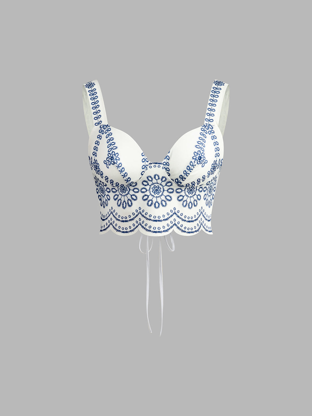 Chic women's printed two-piece set featuring a sleeveless tie-back top and a matching midi skirt.