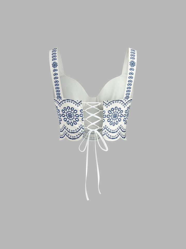 Stylish blue & white printed skirt set for women, ideal as a sleeveless tie-back vacation outfit.