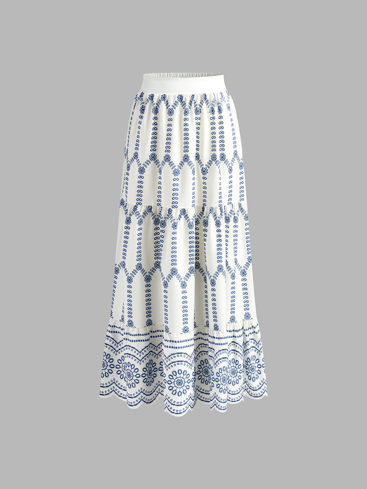 Vibrant blue and white printed sleeveless top and midi skirt women's matching set, summer fashion.