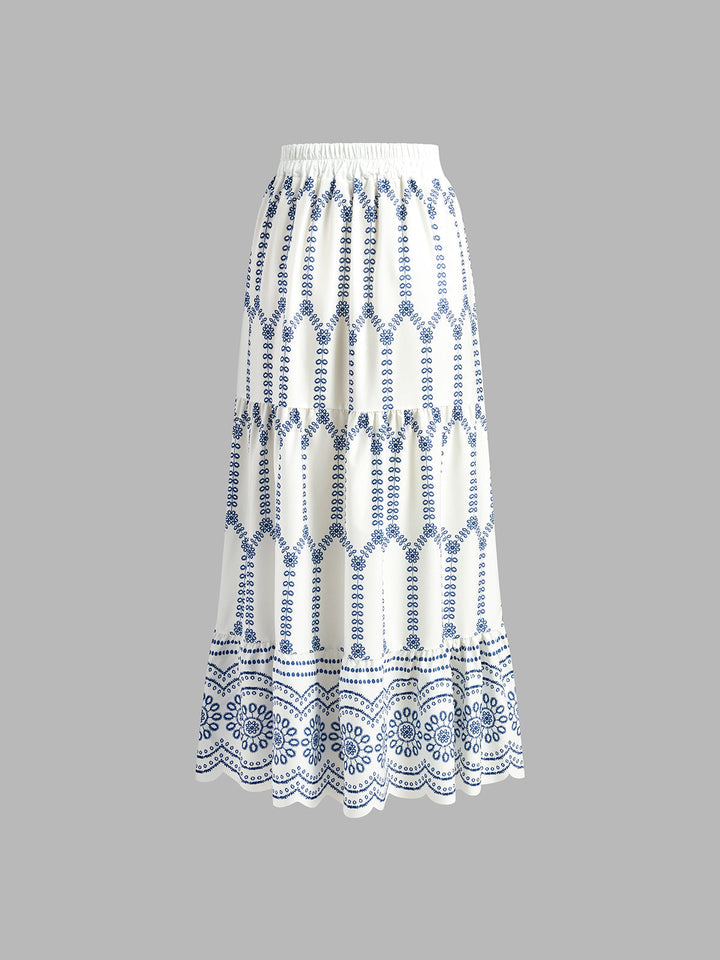Women's sleeveless top with tie-back detail and matching printed midi skirt, a chic 2-piece set.