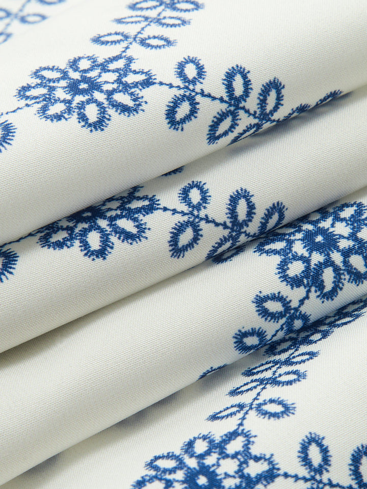 Complete women's summer outfit: blue & white printed sleeveless top & midi skirt two-piece set.