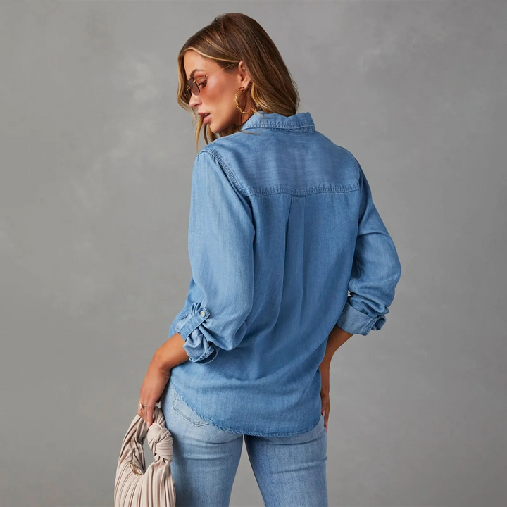 Versatile women's long sleeve blue button-up shirt, perfect for casual wear, featuring a comfortable relaxed fit.